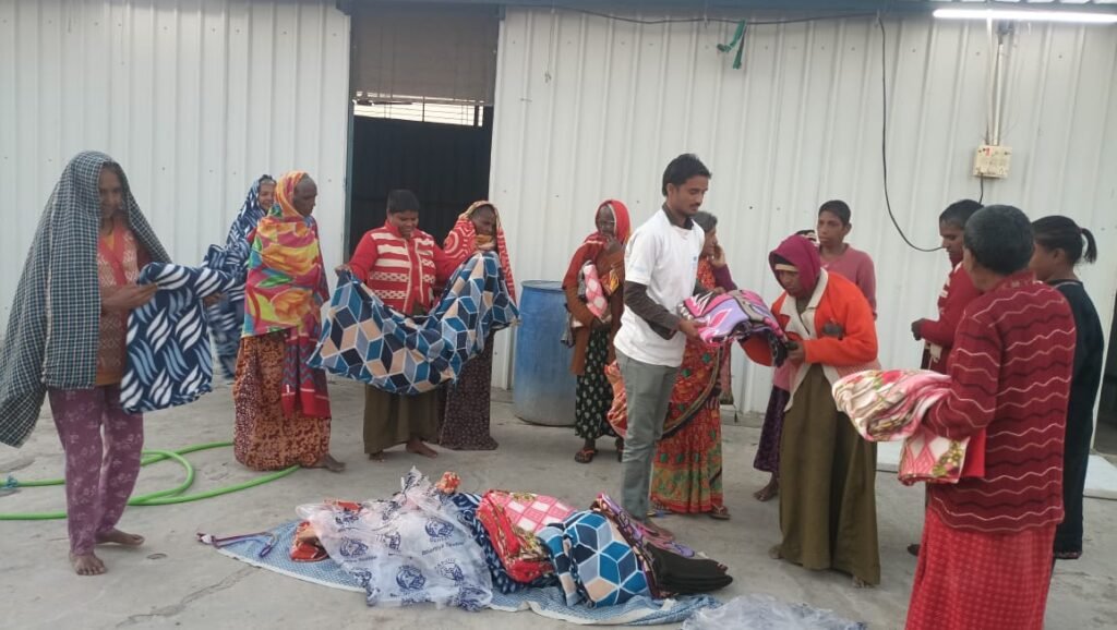 Distribution of blankets to the needy.